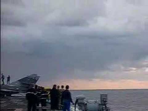 F-18 perform Fly-By over Charles de ...