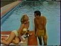 Neil Sedaka wimps out with the bikini babes