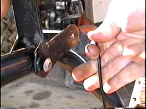 how to adjust auger belt on snowblower