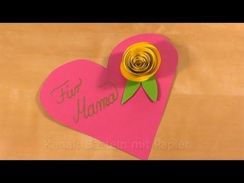 basteln - Muttertag basteln: Muttertagsgeschenke basteln mit Papier Die Rose aus Papier auf dem Herz aus Papier ist ein schönes Muttertagsgeschenk dass sich sehr schne...