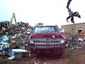 Demolishishing & Crushing a 86 chevy k10 with an excavator
