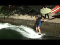 Surfing on the Isarkanal, Thalkirchen, Munich Surfing on the Isarkanal, Thalkirchen, Munich