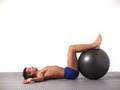 10 Swiss Ball Spinal Twist