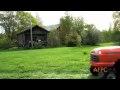 Evil Dog Riding a Lawnmower - Dramatic Dog Lawnmower Ride