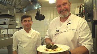 Forellenfilet im Weinblatt gegart auf Ragout von Birne, Trauben und Walnüssen