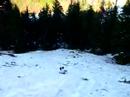 Sliding in the summer snow at Heather Lake