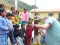 john plays melodica for the kids at the casa's school in the sacred valley, peru, february 2008