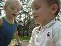 Noah and Brandon jumping on trampoline