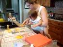 Nina making a handprint