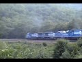 more footage from august 4, 1994 - this westbound tv train seemed unremarkable at first...and then i noticed the fourth locomotive.  the 6268 was an sd40 built in 1971 for the penn central, and here it is 23 years later on a hotshot intermodal led by two of the c40-8ws that were replacing its brethren in their numbering series.

rosters list the 6268 as having been retired this very same month - could this have been its last hurrah, charging westward one more time to show its replacements how it's done?