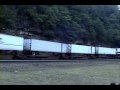 more footage from august 4, 1994 - this westbound tv train seemed unremarkable at first...and then i noticed the fourth locomotive.  the 6268 was an sd40 built in 1971 for the penn central, and here it is 23 years later on a hotshot intermodal led by two of the c40-8ws that were replacing its brethren in their numbering series.

rosters list the 6268 as having been retired this very same month - could this have been its last hurrah, charging westward one more time to show its replacements how it's done?