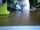 Me making a Japaneese Brocade out of 6 pieces of paper with some instructions on how to do it at the same time as I am doing it.