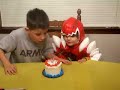 Cayson blowing out candles