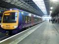 fTPE 170306 & 170302 depart Huddersfield with howl (19/11/08)