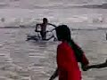 Mumbai - boy riding cycle in the sea!