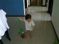 Gabriel Mopping Floor with a Stalk of Flower