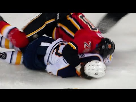 Video: Sabres’ Beaulieu exits game after falling to the ice during fight with Flames’ Lazar