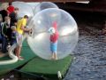 Persons in the water inside a big air ball # 2 /Swedish Water Game/Helsinborg 25 July 2009