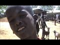 http://www.TravelsWithSheila.comPeople travel through South Ethiopia to visit its unique tribes.  The Hamer hold their weekly Monday market in Turmi.  Their chance to sell, buy and socialize with friends.  The Hamer use a combination of butter and ochre (an iron in soil) to make a red concoction then smeared on their bodies and hair.  Scantily dressed in intricately decorated goat skins, beads and shells, they are an incredible sight.The only drawback?  You must pay about 10 cents to photograph them...and that's per click.  The Hamers keep an eagle eye on how many times you press the shutter!