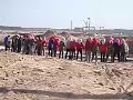 Hui Women pulling cable