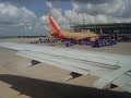 Funny Flight Attendant Taking off from Houston with Water