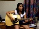 Amarillis Hernandez On Her Guitar