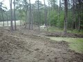 Final Stages of Pond Digging in Magnolia Texas Final Stages of Pond Digging in Magnolia Texas