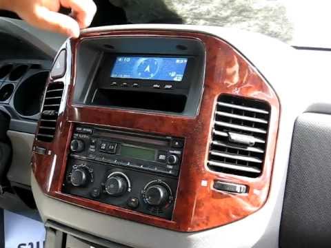 How to Remove Radio / CD Changer from 2004 Mitsubishi Montero for Repair