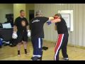 Joe Lewis hits Larry Greenblat during a demo just a bit harder than expected