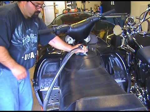 how to drain old gas from snowmobile