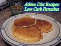 here is my breakfast low carb cooking video where i make my favorite low carb pancake recipe.  this isn't induction friendly due to the baking mix, but you could substitute some almond flour to make it induction legal.  here's the recipe:
* 8oz pkg cream cheese
* 3 eggs
* 3 tsp splenda or equivalent liquid splenda
* 1/4 cup atkins bake mix *recipe below
* 1/2 tsp baking powder
* 1/2 tsp vanilla
* 1/4 cup heavy cream or buttermilk 

beat cream cheese with mixer until blended smooth.  add the remaining ingredients, and let sit for 5 minutes.   preheat non-stick pan to med/high heat.   spray pan with non stick spray and use 1/4 cup measure per pancake.   yield 10 pancakes.

nutrition info:
total calories 107, fat: 10g, carbs: 1.7g, protein: 4g