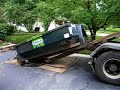Loading a dumpster