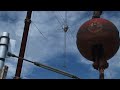 Stack of two 40m OWA Yagis at 107 and 190 feet with crane. John, W2GD and Don, K4ZA on the tower. Craig, K9CT and Mike, N7MB on the ground. Videographer is Doug, KC9GMS