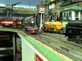 first train night for 2009. features illinois central orange freight, canadian pacific freight in ho, lionel 700 series passenger cars, and a little set from katsumi.