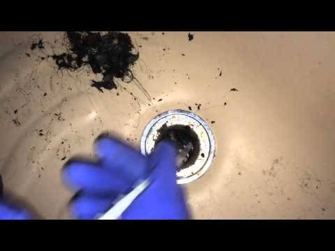 how to drain a bathtub with a snake