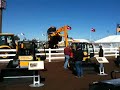 ICUEE: Poppin' a Wheelie in a JCB Backhoe Loader