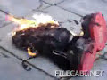 Tickle Me Elmo is BURNED TO A CRISIP