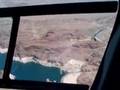 Helicopter flying over Hoover Dam