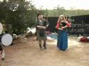 Haggis Rampant, the family troupe of bagpipes and drums, plays Sunday Afternoon on the Celtic Green Stage during the Closing Weekend of the Louisiana Renaissance Festival 2007. In this clip, Steve and Gillian kept the bagpipes skirling while Pam accompanied them on the bodhran. Check out www.haggisrampant.com for more information -- they have a new CD available! And for more renaissance pictures and fun, go to www.ryleh.org at your convenience.