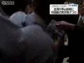 A Chinese man throws bottles at Ex-Taiwanese President