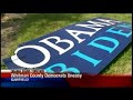 Obama-signs-torched-