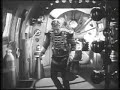 Flash Gordon parachutes from a rocketship