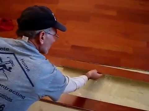how to attach wood to a concrete floor