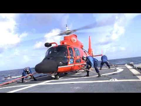 US Coast Guard H-65 Helo lands on ...