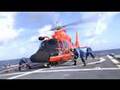 US Coast Guard H-65 Helo lands on USCG Cutter Diligence