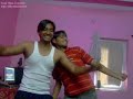two funny indians boys dancing in the home