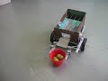 Robotic golf ball and tennis ball sorter.