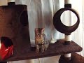 Bengal and Egyptian Mau playing on cat tree Bengal and Egyptian Mau playing on cat tree