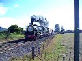 Ja 1250 Diana, assisted by twin DC diesels (for the 9km Kaimai tunnel), roar through Taupiri, Waikato with a 14 carriage express train, running from Auckland to Mt Maunganui and return. Over 1000 people travelled on options associated with this trip.