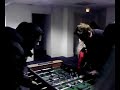 Josh Homme and Mike Skinner playing table football Josh Homme and Mike Skinner playing table football
